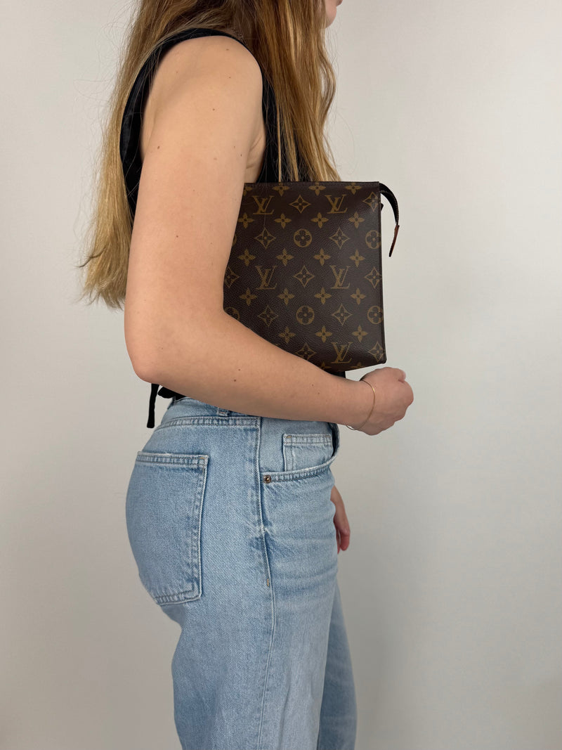 Louis Vuitton Toiletry Pouch 26 - worn