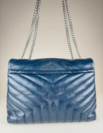 Yves Saint Laurent Loulou - respace.studio